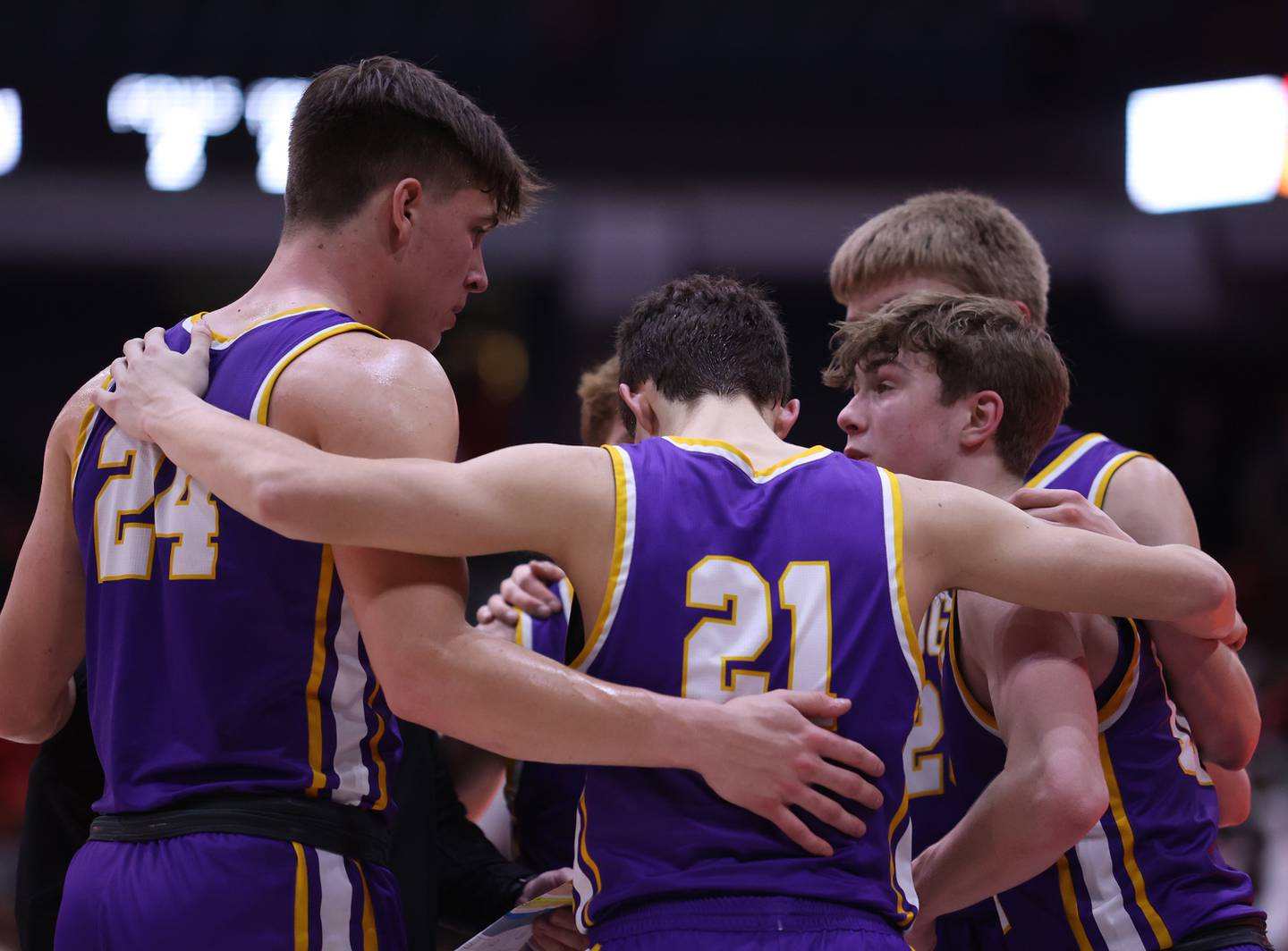 Downers Grove North huddles up during the boys 4A super-sectional game between Kenwood Academy and Downers Grove North high school in Chicago on Monday, March 6, 2023.
