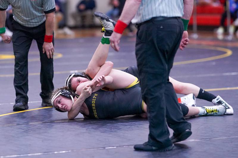 Shaumburg’s Madeline Zerafa-Lazarevi (top) pins Andrews’ Alyssa Keane to win the 140 pound championship in the Schaumburg Girls Wrestling Sectional at Schaumburg High School on Saturday, Feb 10, 2024.