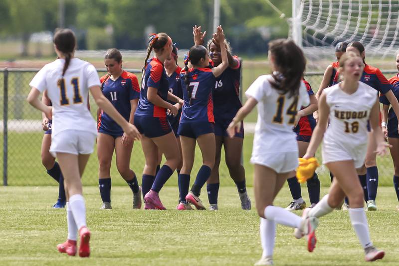 Oswego's Jordyn Washington (18) celebrates her second goal with teammates during Class 3A regional final soccer match between Neuqua Valley at Oswego on Saturday, May 23, 2026 in Oswego.
