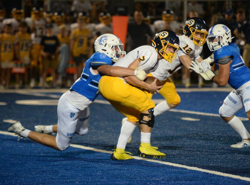 St. Francis's Anthony Suriano takes down Sterling's Kael Ryan during their home game Friday Sept 2, 2022.