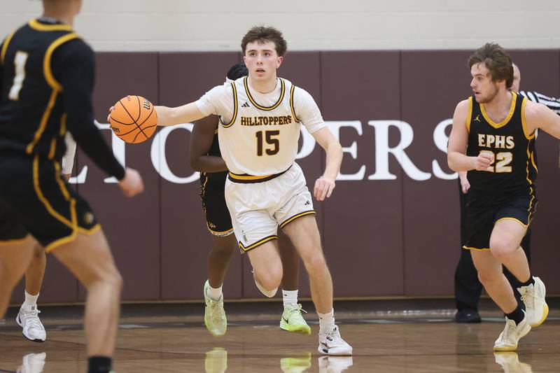 Joliet Catholic’s Brday Tunkel heads upcourt after a forced turnover against Elmwood Park in the Class 3A Joliet Catholic Regional semifinal game on Wednesday, Feb. 25, 2026 in Joliet.
