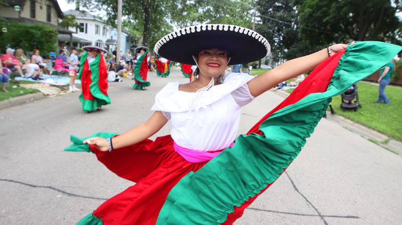 A dancer from Academia de Danza Azatlan participates as the Fiesta Days Parade makes its way down Main Street in McHenry on Sunday, July 20, 2025.