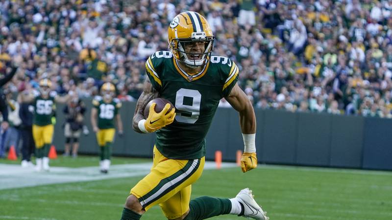 Green Bay Packers' Christian Watson runs for a touchdown during the first half of an NFL football game Sunday, Oct. 2, 2022, in Green Bay, Wis. (AP Photo/Morry Gash)