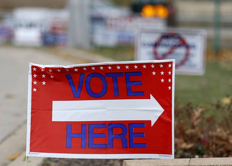 A sign directs voters to the right location at the McHenry Township Government Complex, 3703 N. Richmond Road in Johnsburg, on Friday, Nov. 4, 2022. The polls will be open on Election Day from 6 a.m. to 7 p.m.