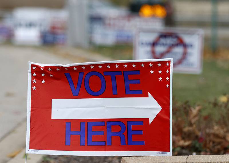 A sign directs voters to the right location at the McHenry Township Government Complex, 3703 N. Richmond Road in Johnsburg, on Friday, Nov. 4, 2022. The polls will be open on Election Day from 6 a.m. to 7 p.m.