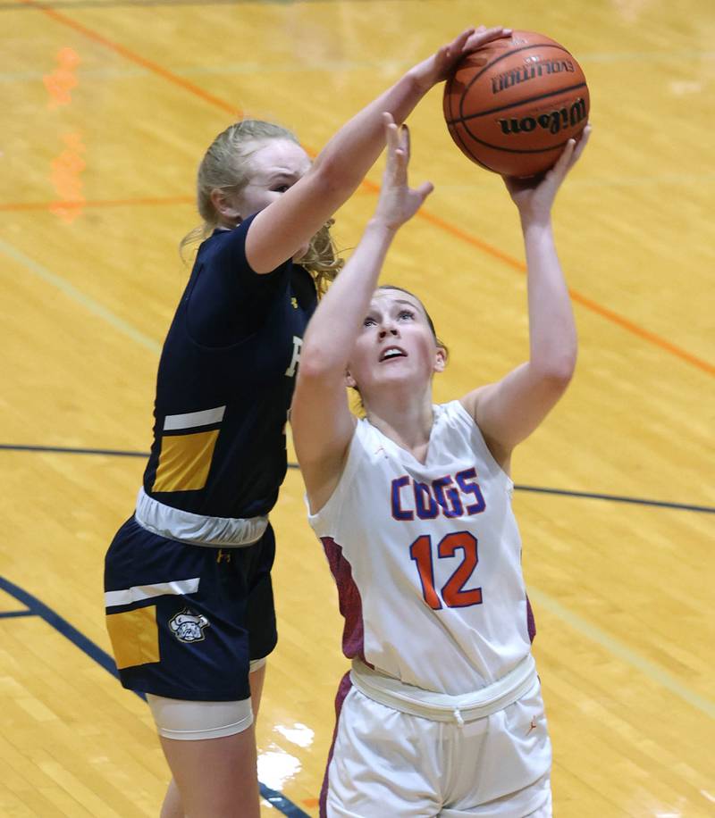 Genoa-Kingston's Ally Poegel has her shot blocked by Polo’s Camrynn Jones during their game Monday, Jan. 29, 2024, at Genoa-Kingston High School.