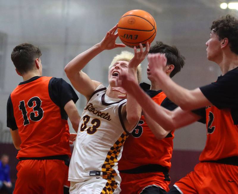 Richmond-Burton’s Luke Robinson works under the hoop against Crystal Lake Central in varsity boys basketball E.C. Nichols tournament championship game action on Saturday, Dec. 27, 2025, at Homer “Bill” Barry Gymnasium on the campus of Marengo High School in Marengo.