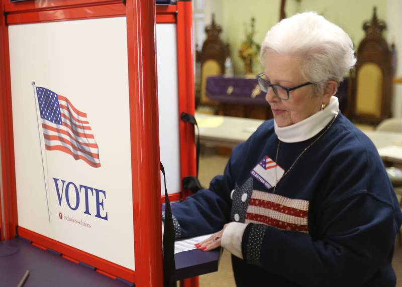 Election judge Shelia Abraham fills out her ballot on Tuesday, April 1, 2025 at Zion United Church of Christ in Peru.