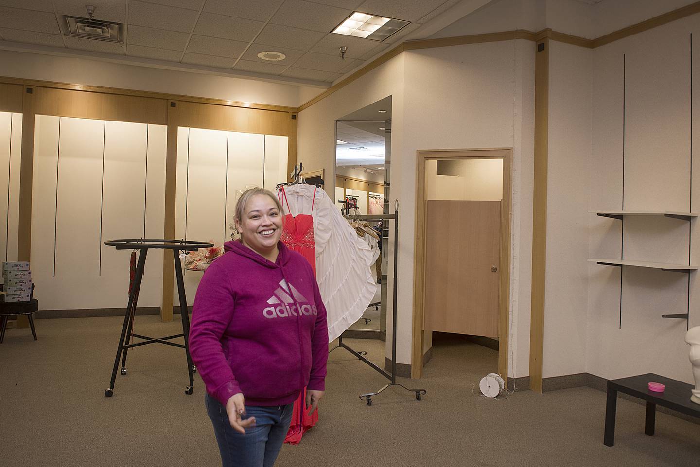 Celeste Fernandez, designer at Carolitza’s in Sterling, talks about the move from one storefront to another March 9, 2022 at the mall. The store is tripling their floor space with the move.