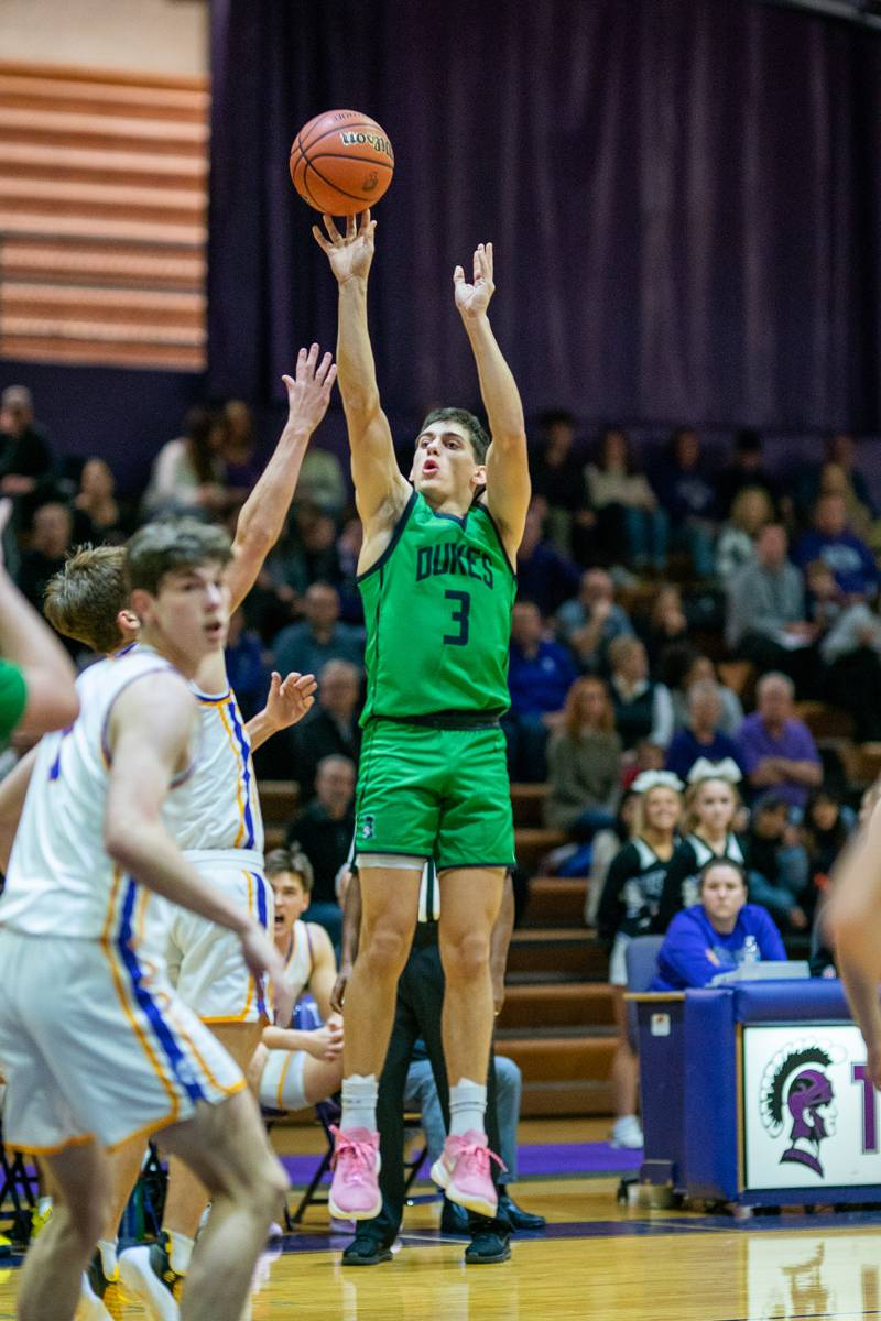York's A.J. Levine (3) shoots a three-pointer against Downers Grove North during a basketball game at Downers Grove North High School on Friday, Dec 9, 2022.