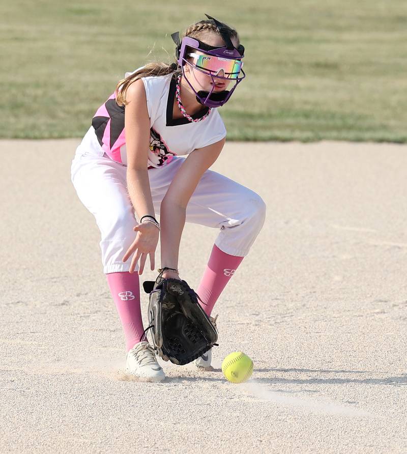 Kishwaukee Valley Storm 10u player Emma Wilczek fields a grounder Wednesday, June 21, 2023, during a scrimmage game against the Poplar Grove Power at the Sycamore Community Sports Complex. The Kishwaukee Valley Storm is hosting the Storm Dayz tournament this weekend which draws about 70 teams and runs Friday through Sunday in Sycamore.