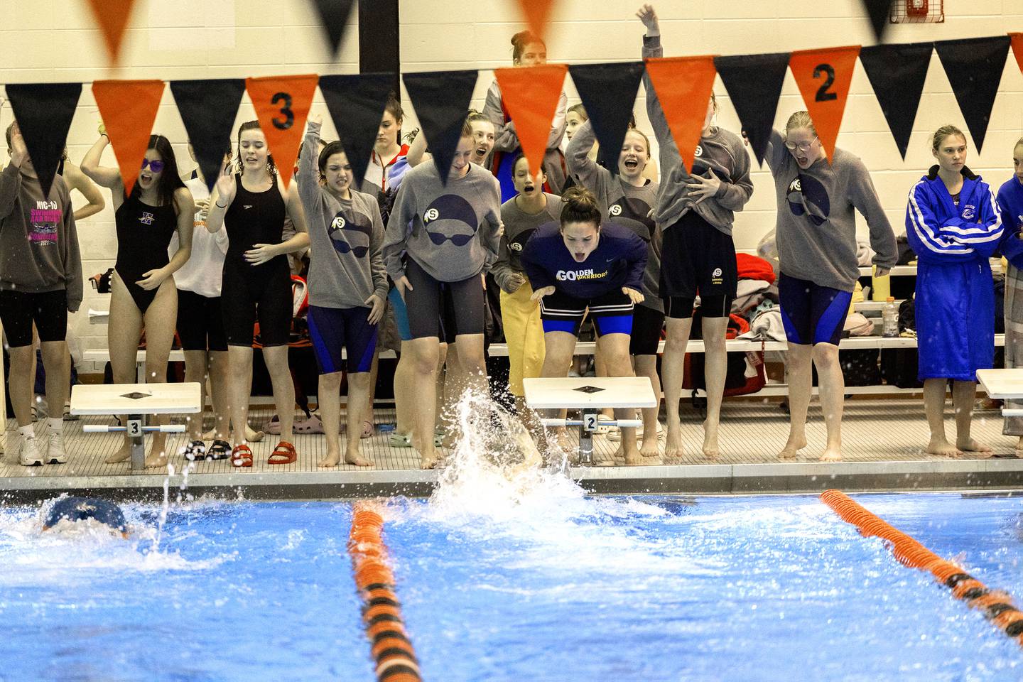 Sterling teammates cheer on Madison Austin in the 100 yard Freestyle Saturday, Nov. 5, 2022 at swimming sectionals in Byron.