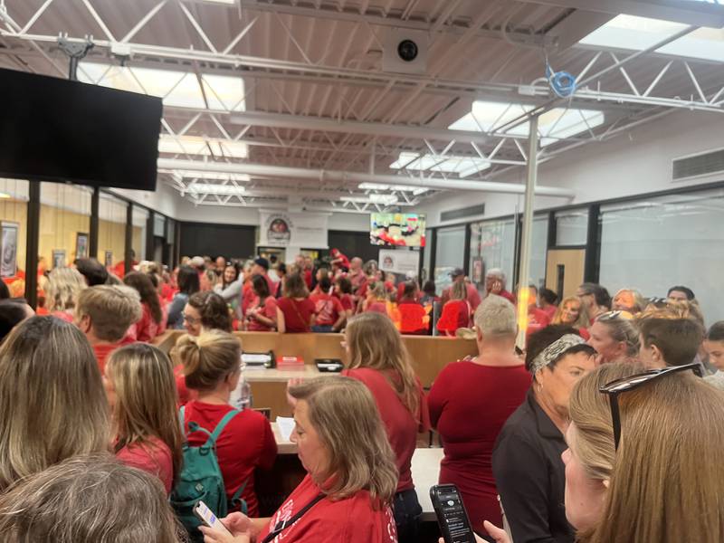 Hundreds of parents and teachers packed the Crystal Lake District 47 administration office during a board meeting to show solidarity during contract negotiations with teacher union.