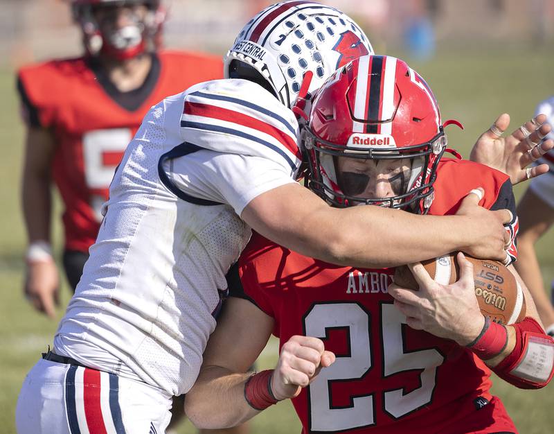Amboy’s Brayden Klein is hit by West Central’s Cooper Gibb Saturday, Nov. 2, 2024, in the 8-man football league first round playoffs.