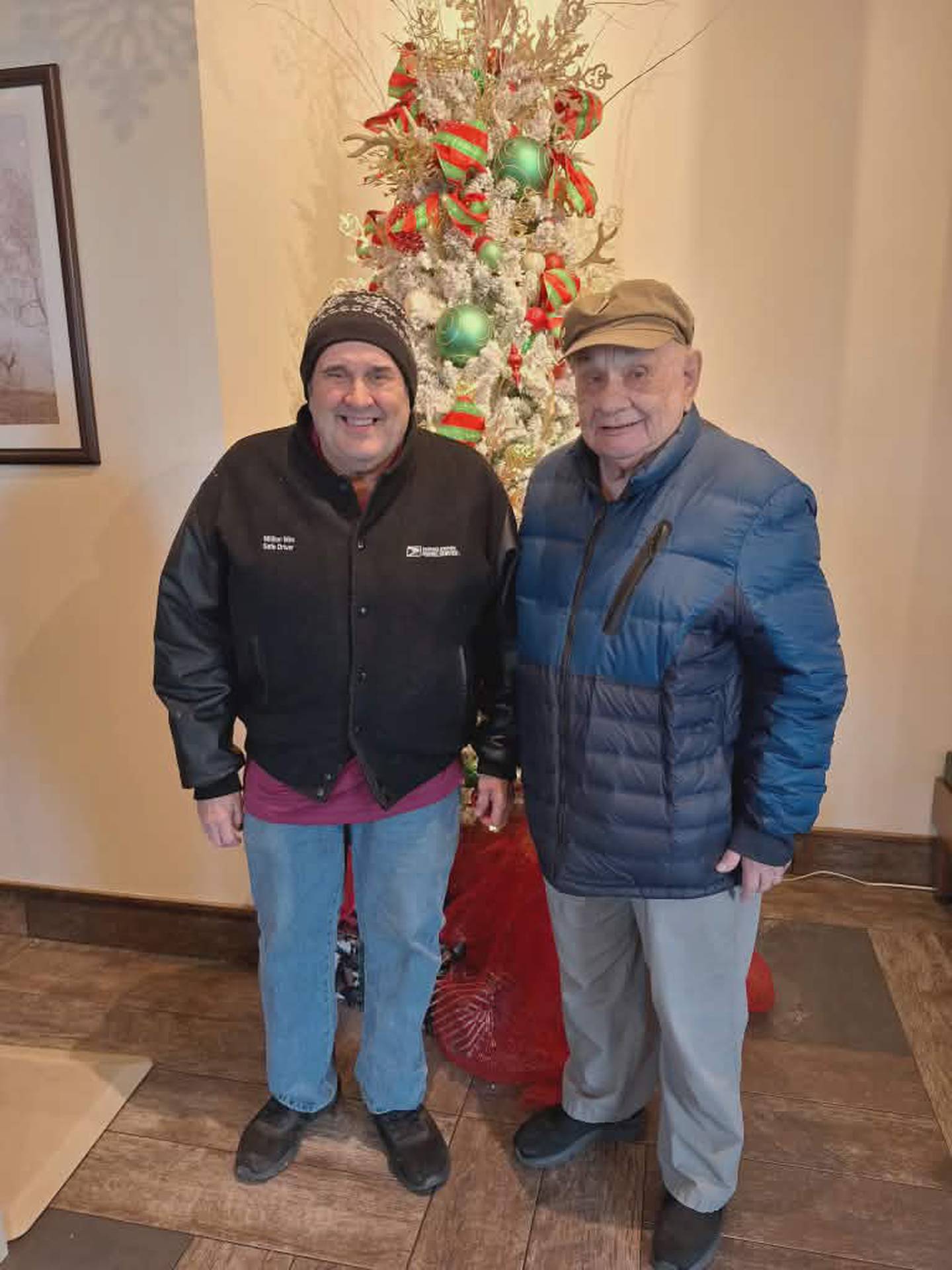 Mike Maloney (right) of Diamond, retired from the United States Postal Service in November after nearly 42 years of service. He's pictured with his father Jim Maloney of Joliet in December. Jim Maloney also retired from the United States Postal Service, in 1987 after 34 years of service.