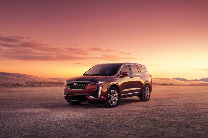 2023 Cadillac XT6 Premium Luxury shown in Rosewood Metallic, front 3/4 angle