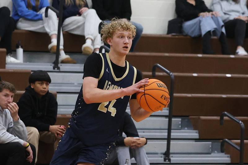 Lemont’s Alanas Castillo looks to pass against Joliet Central in the 2024 WJOL Thanksgiving Classic on Wednesday, Nov. 25, 2024 in Joliet.