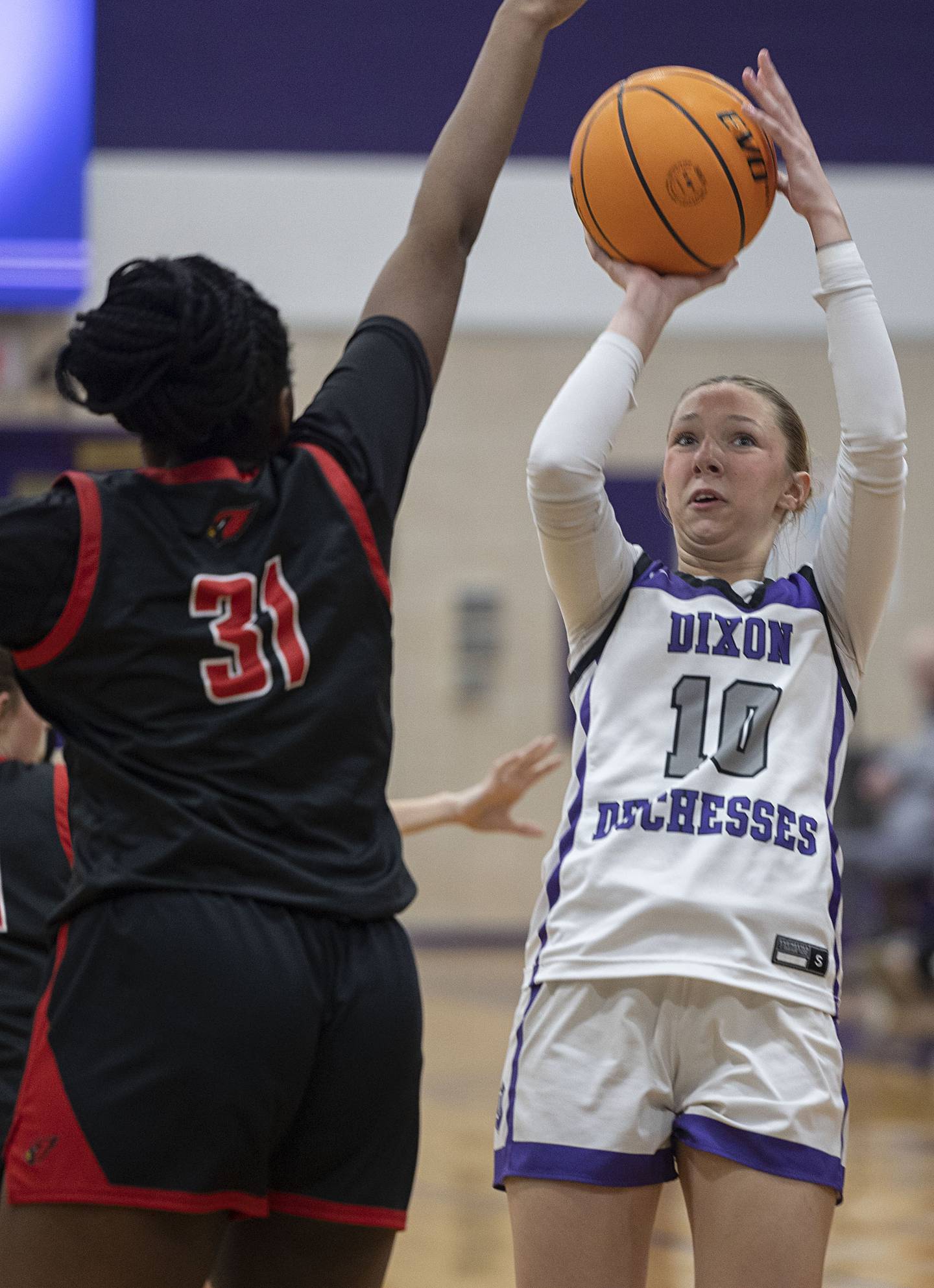 Dixon’s Addy Lohse puts up a shot against Stillman Valley’s Dailene Wade Saturday, Feb. 7, 2026.