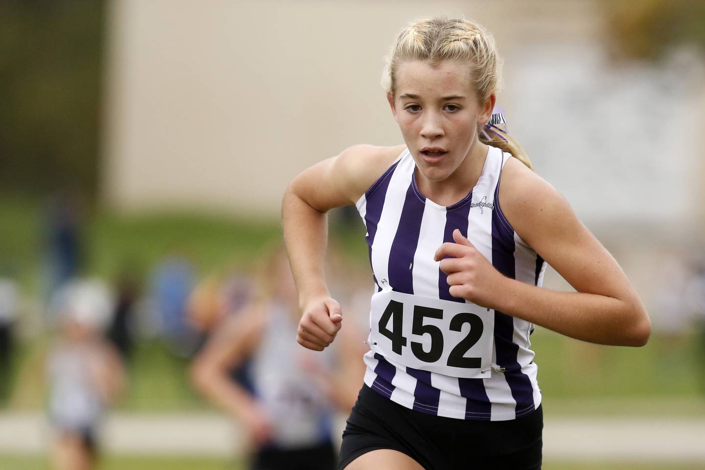 Dixon's Emma Smith heads for the finish line to place 10th during the girls Class 2A Woodstock North XC Sectional at Emricson Park on Saturday, Oct. 30, 2021 in Woodstock.