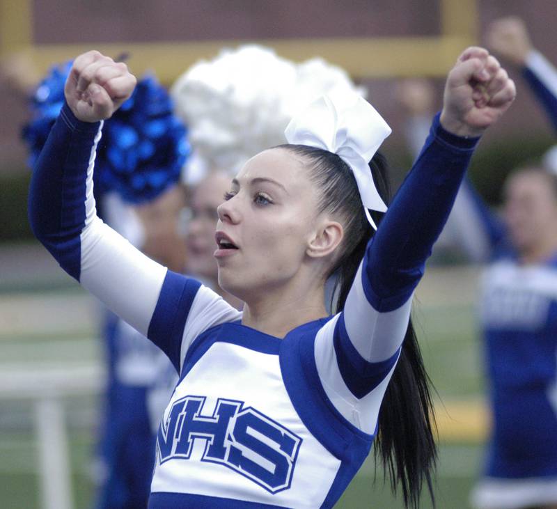 Senior cheeleader Sydni Tessendorf  cheers her team on. Newman Central Catholic H.S hosted Princeton H.S. in a non-conference football game at Sterling H.S, on Friday, August 29, 2025.