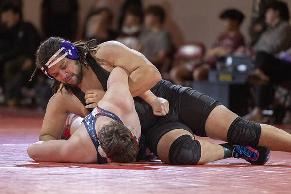 Dixon wrestling advances to state as a team after win over Morrison