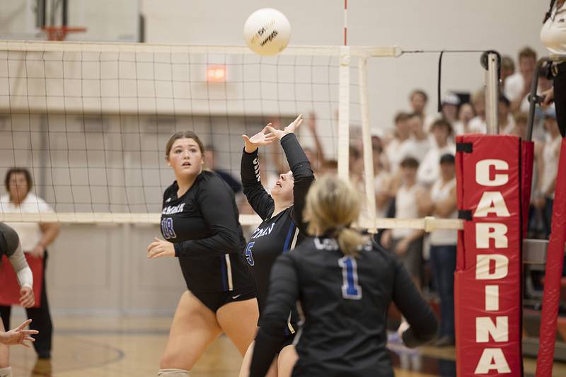 Newman’s Molly Olson sets the ball Wednesday, Nov. 2, 2022 in the sectional championship game against River Ridge.