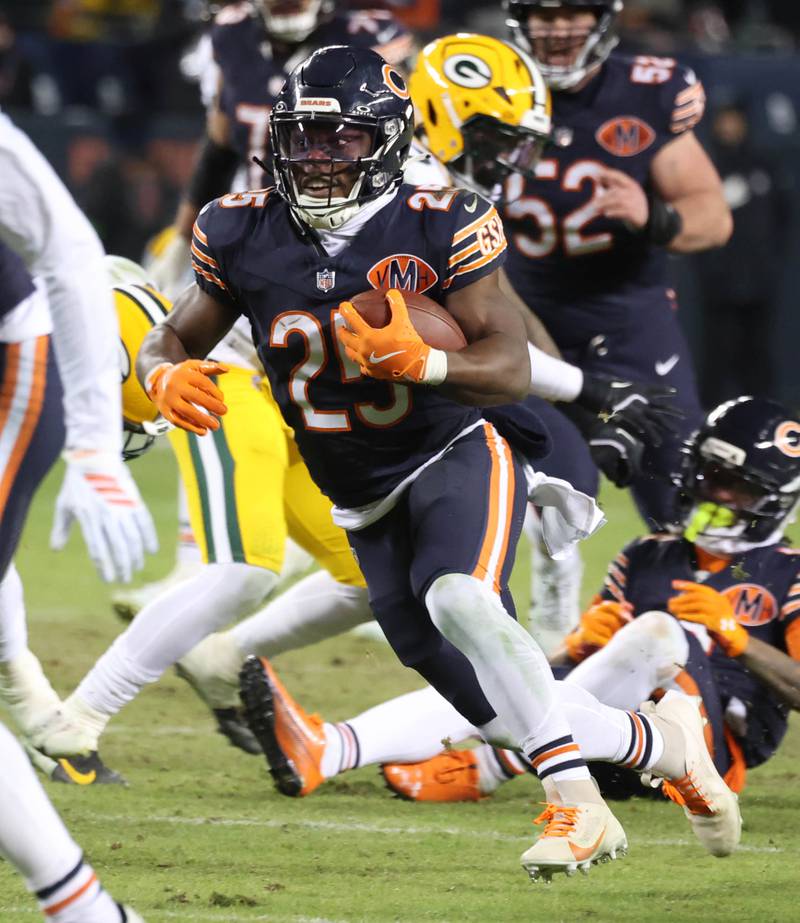 Chicago Bears running back Kyle Monangai picks up yardage after a screen pass during their NFL Wild Card game against the Green Bay Packers Saturday, Jan. 10, 2026, at Soldier Field in Chicago.