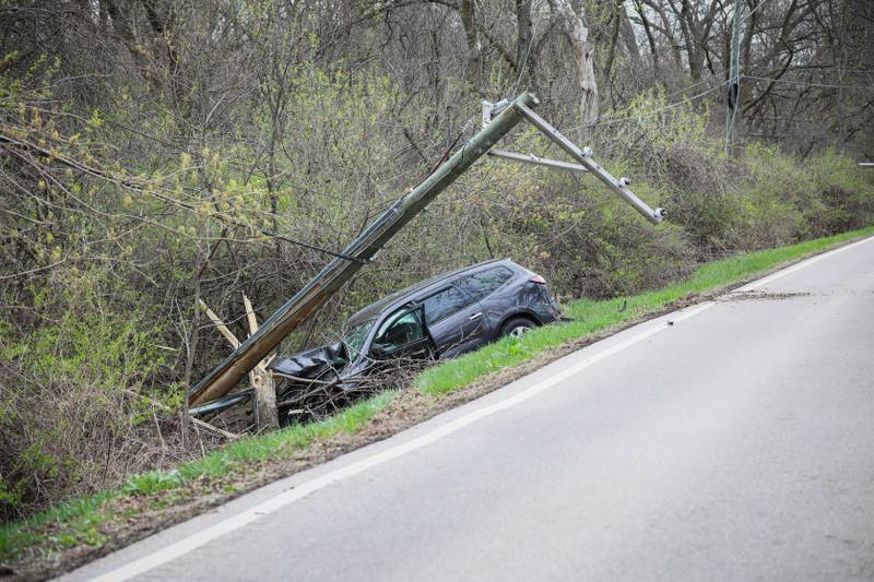 A driver suffered minor injuries after crashing into a utility pole Wednesday, April 23, 2025 near the intersection of Country Club Road and Bull Valley Road in Woodstock.