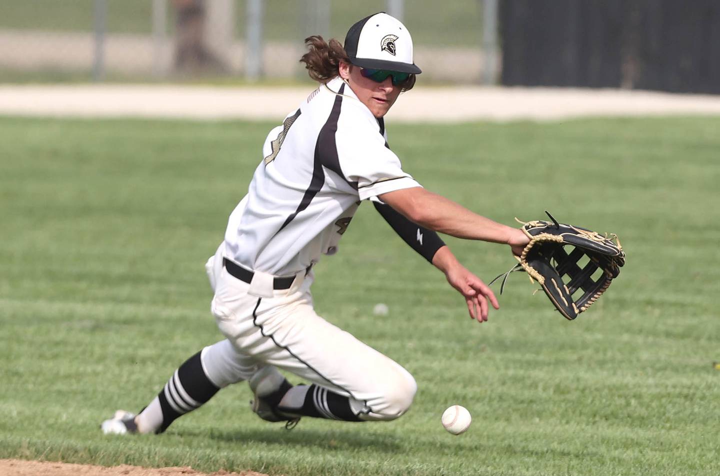 Sycamore's Collin Severson tries to make a play during their game against Morris Tuesday, May 9, 2023, at the Sycamore Community Sports Complex.