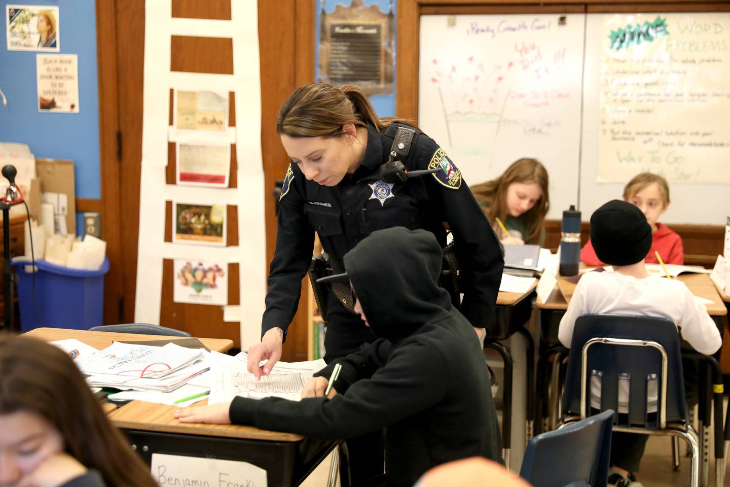 St. Charles Police Officer Meghan Kramer works with fifth-graders at Lincoln Elementary School in St. Charles.