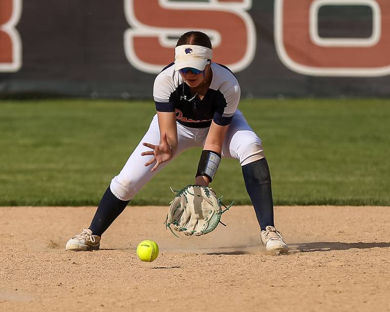 Oswego's Marissa Moffett (5) fields a grounder during Class 4A Plainfield North Sectional final softball game between Wheaton North at Oswego. May 31th, 2024.