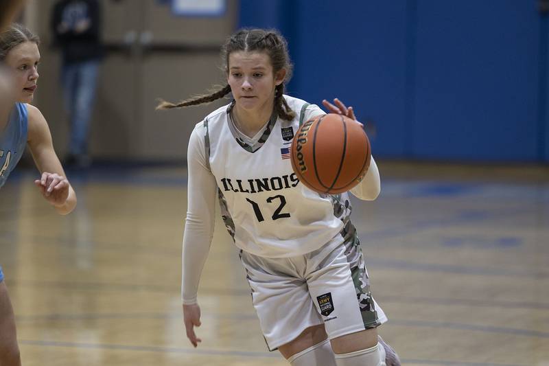 Newman’s Lucy Oetting dribbles the ball against Bureau Valley Monday, Jan. 23, 2023.