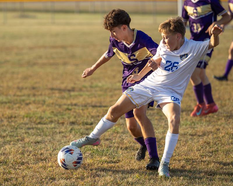 Chase Dickmann (26) of Somonauk/Leland/Newark manouvers ball as Damien Gonzalez (6) attempts to steal possession on Monday, Sept. 29, 2025, at Serena High School in Serena.