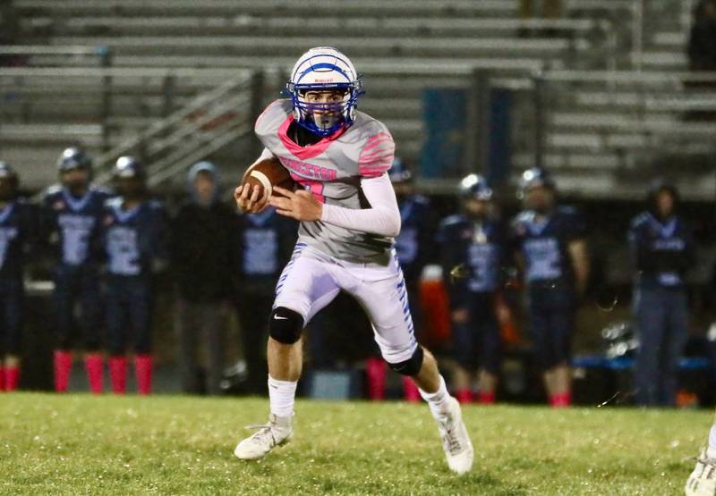 Princeton's Gavin Lanham runs the ball Friday night at Bureau Valley.