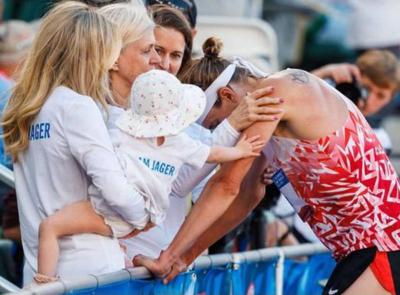 Evan Jager catches his breath after the men's 3,000-meter steeplechase on Sunday at the USA Track and Field Olympic Trials, with his wife Sofia (left), 2-year-old daughter Lovrisa, mother Cathy and sister Mallory. Jager finished fourth and hopes he will run in his third Olympics next month.