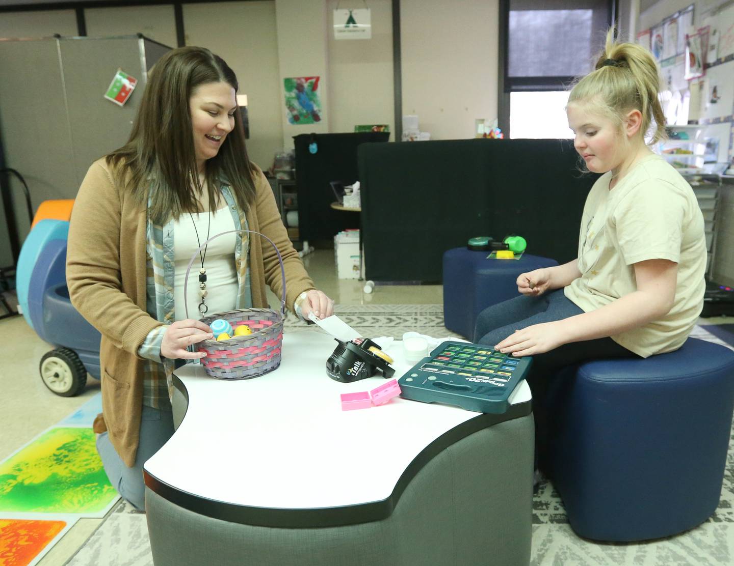 Sally Etzenbach speech pathologist, interacts with student Lennox Taylor on Wednesday, March 22, 2023, at Northview School in Peru.