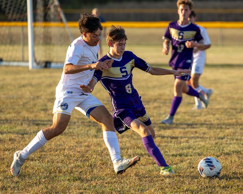 Samson Seiberlich (8) of Serena pushes Evan Sittler (91) of Somonauk/Leland/Newark in pursuit of possession of ball on Monday, Sept. 29, 2025, at Serena High School in Serena.