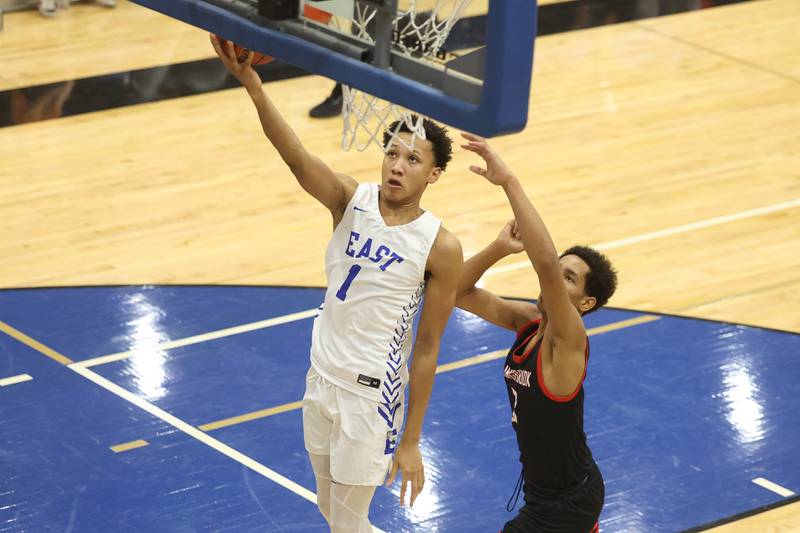 Lincoln-Way East’s Brent Taylor lays in a shot against Bolingbrook on Tuesday, Dec.12th, 2023 in Frankfort.