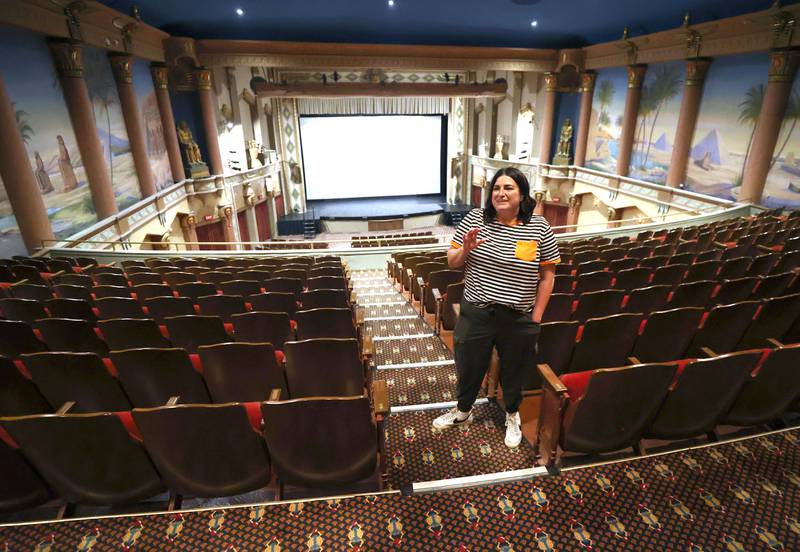 Egyptian Theatre Marketing and Communications Director Jeanine Holcomb talks Tuesday, Oct. 3, 2023, about ghost sightings in the balcony of the theater in DeKalb. The balcony is just one of the places in the Egyptian where there have been reports of paranormal activity.