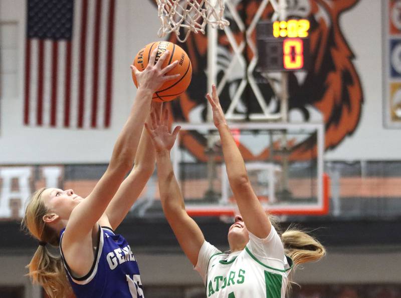 Crystal Lake South’s Gracey LePage battles Geneva’s Emma Peterson for the ball in girls IHSA Class 3A Sectional Championship basketball on Thursday, Feb. 26, 2026, at Crystal Lake Central High School in Crystal Lake.