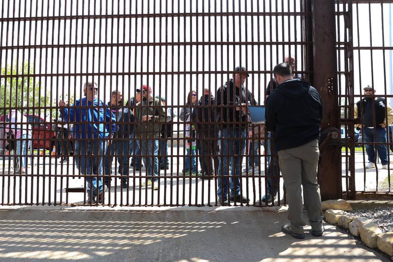 Fans wait for the gates to open at the Joliet Slammers preseason game at the Old Joliet Prison on Thursday, April 29, 2026 in Joliet.