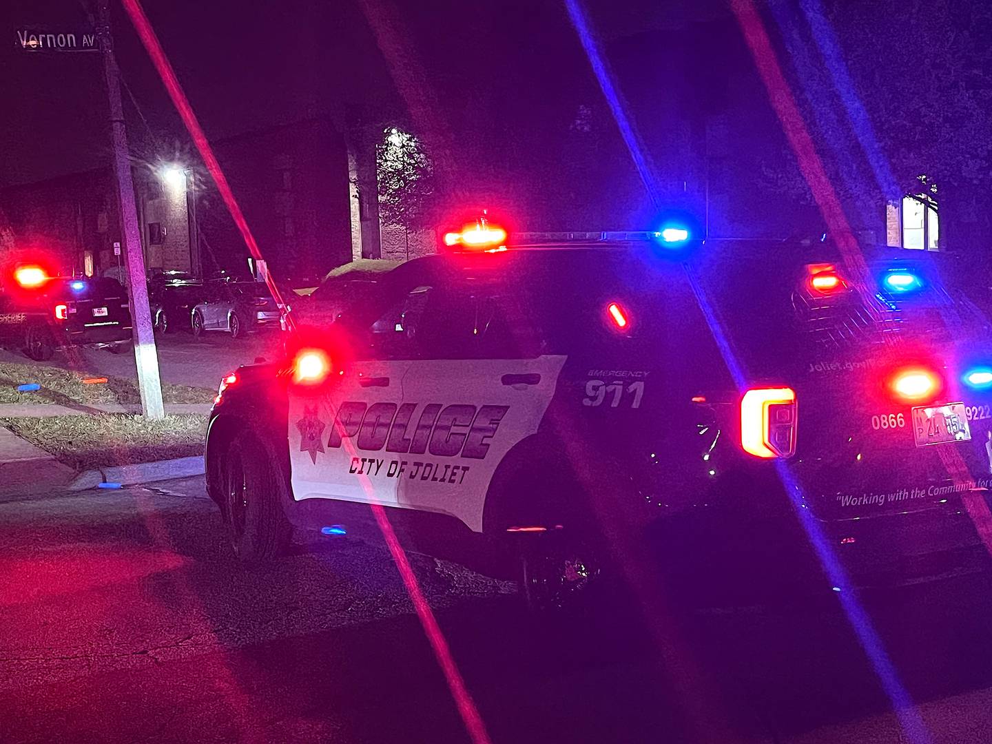 A Joliet Police Department squad vehicle on Thursday at Larkin Village apartments in Joliet.