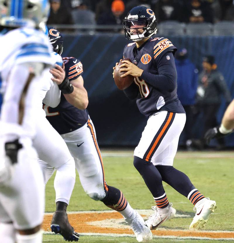 Chicago Bears quarterback Caleb Williams looks for a receiver during their game against the Detroit Lions Sunday, Jan. 4, 2026, at Soldier Field in Chicago.