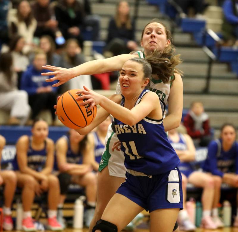 Geneva's Heidi Clesen pulls down a rebound away from York’s Olivia Silkaitis during a 4A Geneva Regional semifinal game on Tuesday, Feb. 18, 2025 in Geneva.