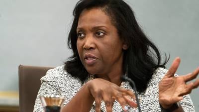 Fed official sues Trump over attempt to fire her, challenging his power over the independent agency