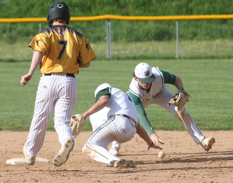 Putnam County's Kade Zaimmerlein reaches second base on an error by St. Bede's Aidan Mullane as teammate Gus Burr (right)  picks up the ball on Tuesday, April 30, 2024 at St. Bede Academy.