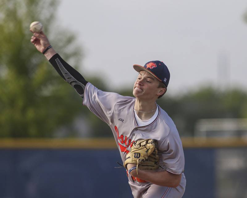 Oswego's Andrew Ronek (1) throws a pitch during baseball game between Oswego East at Oswego. Monday, May 19, 2025 in Oswego.