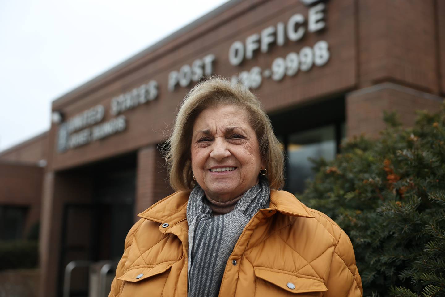 Isabell Camillo stands at the McDonough Street Post Office. Camillo mailed out four checks that have not cleared and she suspects they were stolen so she filed a police report with Joliet police on Jan. 10, 2023.