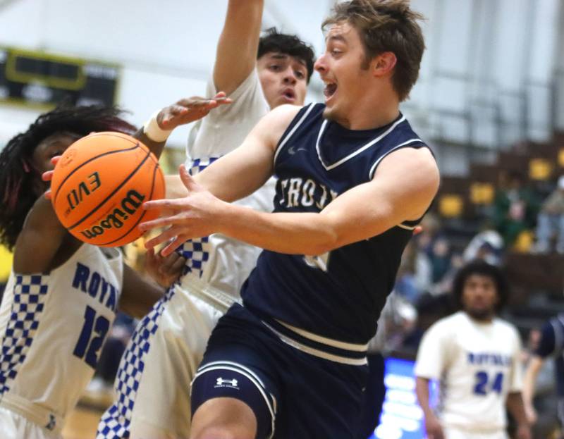 Cary-Grove’s Brandon Freund dishes the ball from under the hoop against Larkin in varsity boys basketball Hinkle Holiday Classic action on Friday, Dec. 26, 2025, at Jacobs High School in Algonquin.