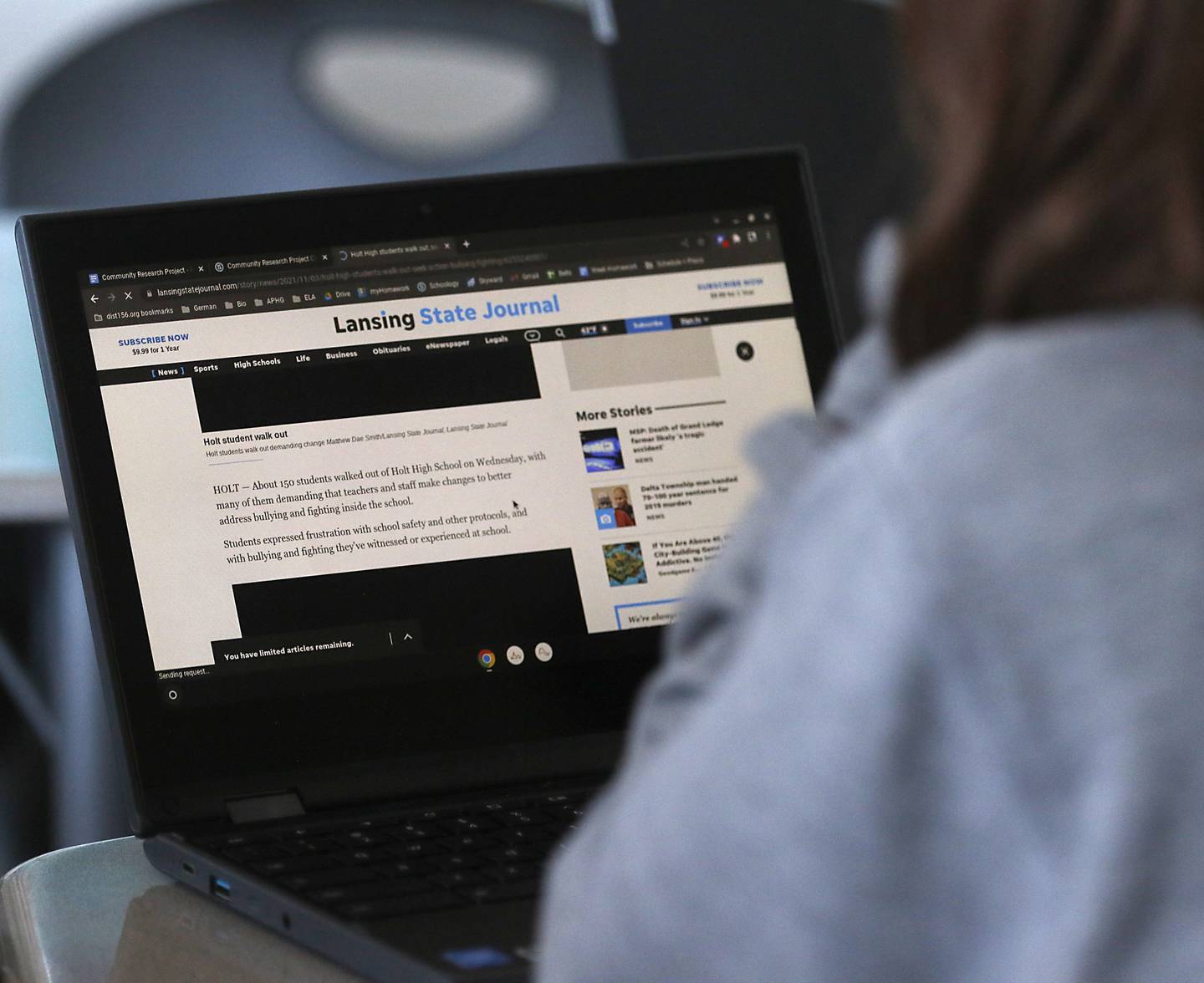 A freshman student at McHenry High School reads a Lansing State Journal story online as they learn about media literacy Tuesday Nov. 22, 2022, during a class at the school's freshman campus, 1012 N. Green St. in McHenry. The students are using a method where they determine the currency, relevance, authority, accuracy, and purpose of a story.